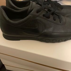 Black Nike leather slightly worn